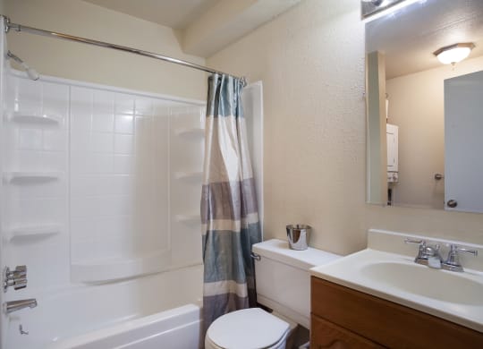 Bathroom with a shower and a sink  at Governor's Park, Fort Collins, 80525